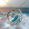Collier pendentif vague océanique